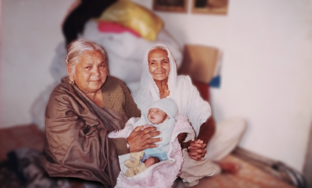 Sardarni Harbans Kaur – Cradling Her Newly Born Grandson, A Legacy of Love Continues